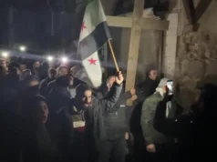 क्रिसमस ट्रि जलाएपछि सिरियामा विरोध प्रदर्शन